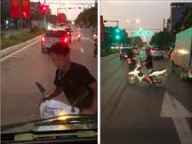 Chạy xe máy ngược chiều người đàn ông chặn đầu rồi bẻ 2 gương trước của ô tô gây bức xúc